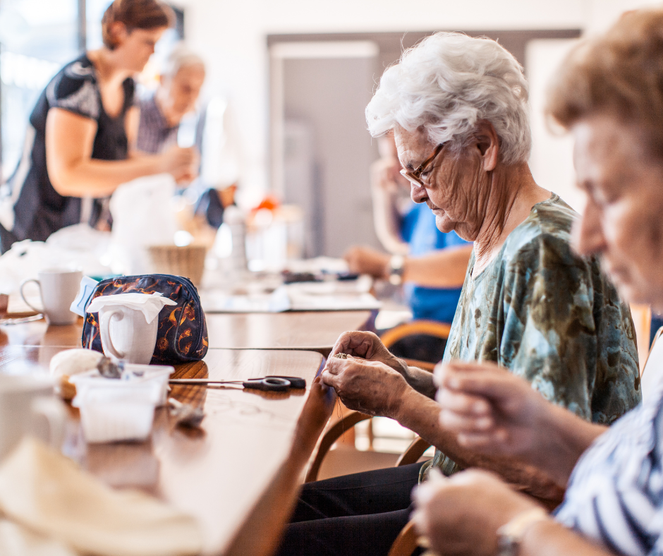 Seniors participating in group activities inside an independent living community in Palm Beach County